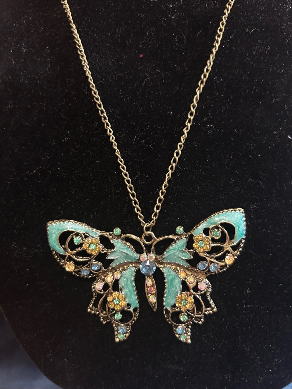 Gold Butterfly Pendant Necklace with Blue Accents
